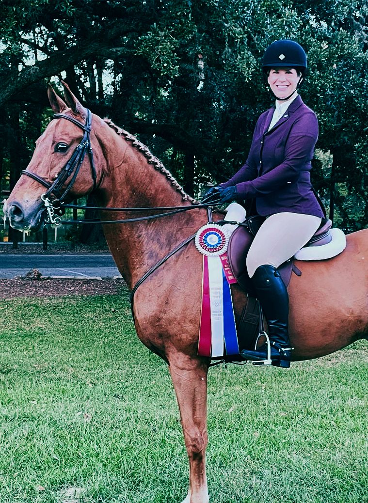 Christine New, owner of Meadow Lane Equestrian Center on Moose winning 2nd at regional championship.